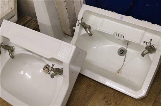 Two ceramic basins and one pedestal